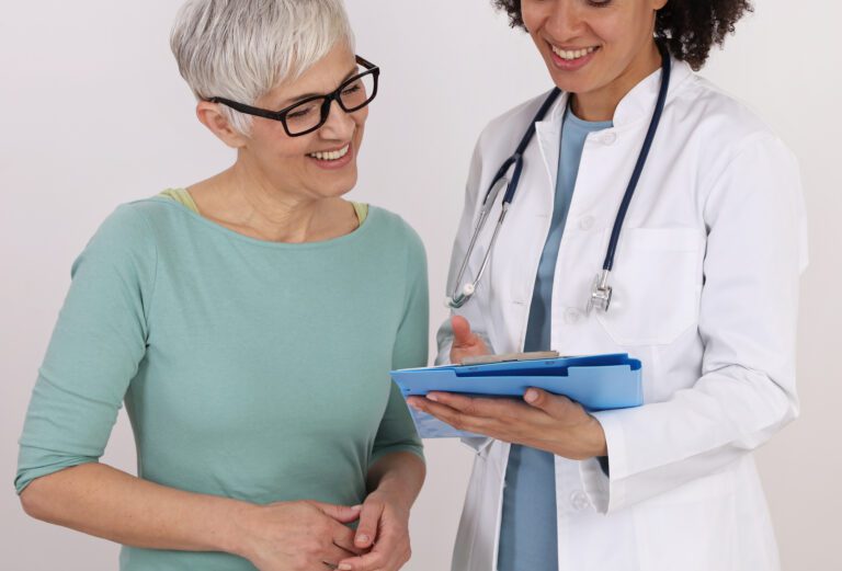 Mature woman receives information about hormone therapy options from a licenced professional.